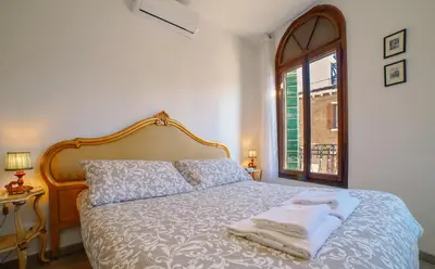 Letto o letti in una camera di Amorucci House