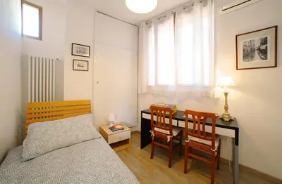 Letto o letti in una camera di Amorucci House