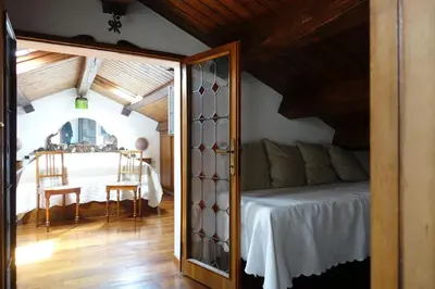 Letto o letti in una camera di Ca' Della Carita'