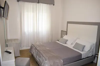 Letto o letti in una camera di Hotel Edelweiss