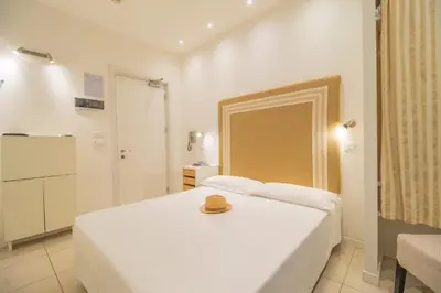 Letto o letti in una camera di Hotel Speranza