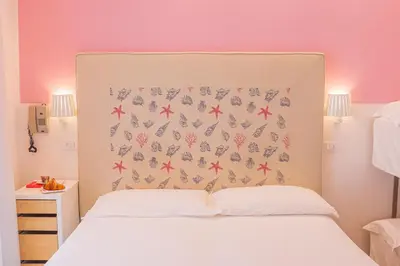 Letto o letti in una camera di Hotel Speranza