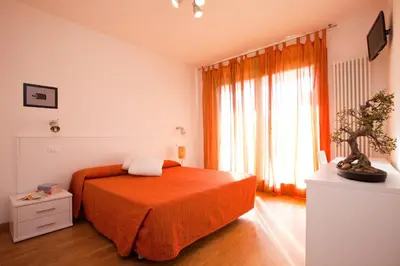 Letto o letti in una camera di Residence Speranza