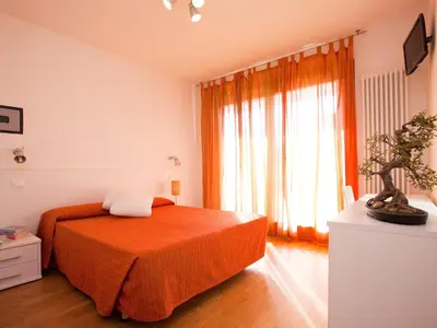 Letto o letti in una camera di Residence Speranza