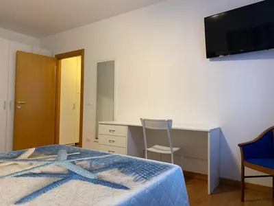 Letto o letti in una camera di Residence Speranza