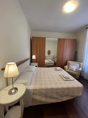 Letto o letti in una camera di Montecchio