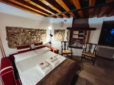 Letto o letti in una camera di Relais nel Castello