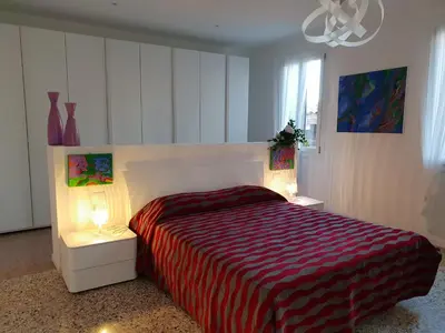 Letto o letti in una camera di Ca San Luca