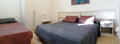 Letto o letti in una camera di Ca San Luca