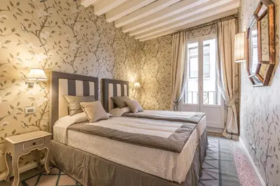 Letto o letti in una camera di Ca' Dell'Opera Terrace - Dimora Italia -