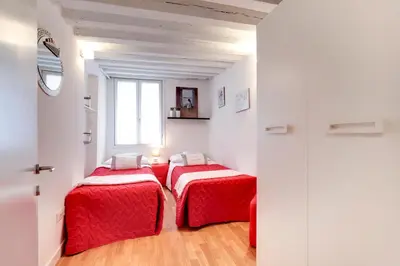 Letto o letti in una camera di Cannaregio Canal View - Marco Polo by Wonderful Italy