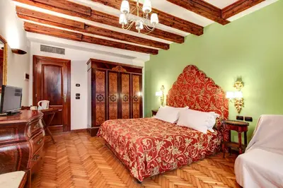 Letto o letti in una camera di San Marco Superior Apartments by Wonderful Italy
