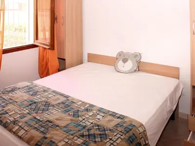 Letto o letti in una camera di Apartment Casa Debora-1 by Interhome