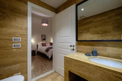 Letto o letti in una camera di Ca' Molin Cuoridoro - Guarana
