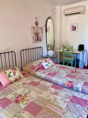 Letto o letti in una camera di Ca' Borgo delle Rane
