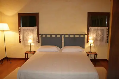 Letto o letti in una camera di Locanda Antico Fighèr