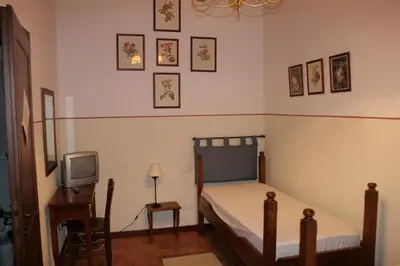 Letto o letti in una camera di Locanda Antico Fighèr