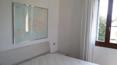 Letto o letti in una camera di Casa per Venezia&Treviso