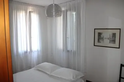 Letto o letti in una camera di Casa per Venezia&Treviso