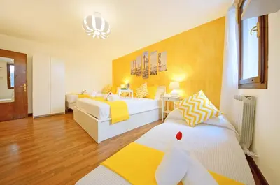 Letto o letti in una camera di San Marco Apartment Fabbri