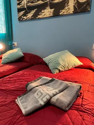 Letto o letti in una camera di TINTORETTO 1 CON TERRAZZA SOPRA IL TETTO, 3 bagni, 3 grandi camere da letto, SUPER NUOVO