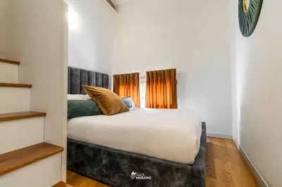 Letto o letti in una camera di FILIGRANA House by Sleep in MURANO