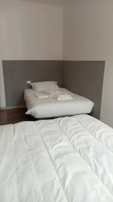 Letto o letti in una camera di Casa Belzoni