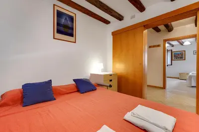 Letto o letti in una camera di B&B Giardini