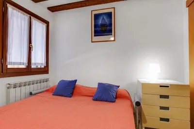 Letto o letti in una camera di B&B Giardini