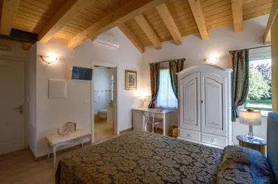 Letto o letti in una camera di Cadifiore B&B