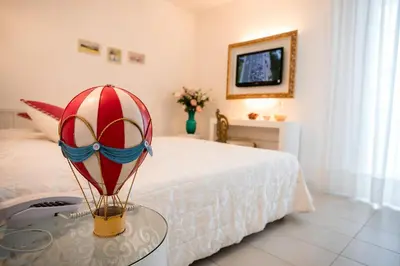 Letto o letti in una camera di Hotel Albatros 3 Stelle Superior