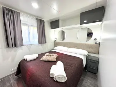 Letto o letti in una camera di Luxury Caravan at Union Lido