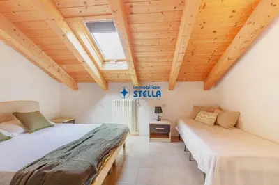 Letto o letti in una camera di Ville Martellozzo