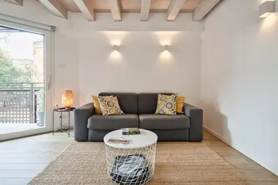 Area soggiorno di Trevisohome BOTTENIGA