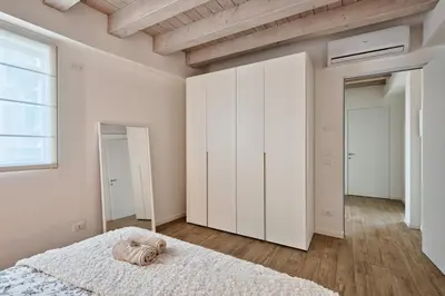 Letto o letti in una camera di Trevisohome BOTTENIGA