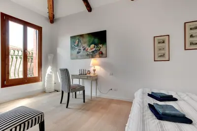 Letto o letti in una camera di San Marcuola apartment