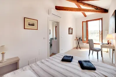 Letto o letti in una camera di San Marcuola apartment