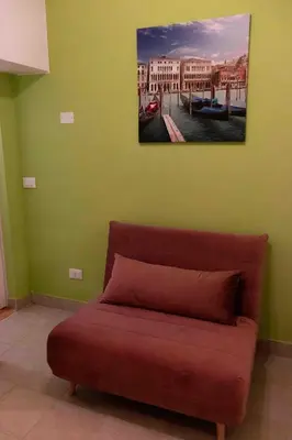 Area soggiorno di La Perla del Doge con Wellness & Spa uso esclusivo - La Perla Apartments