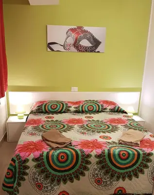 Letto o letti in una camera di La Perla del Doge con Wellness & Spa uso esclusivo - La Perla Apartments