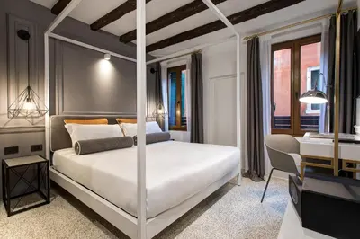 Letto o letti in una camera di San Marco Suite 755