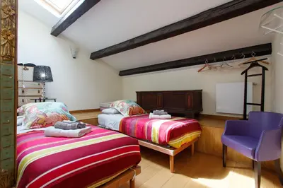 Letto o letti in una camera di Casa Alma