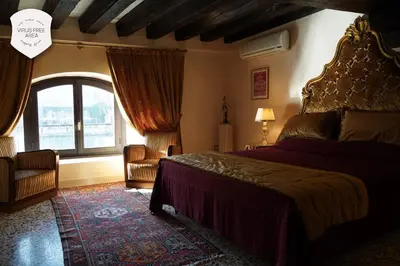 Letto o letti in una camera di Granda Sweet Suites