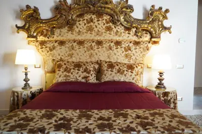 Letto o letti in una camera di Granda Sweet Suites