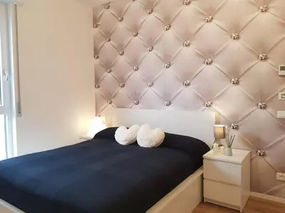 Letto o letti in una camera di Bsuites trieste in centro storico con wifi