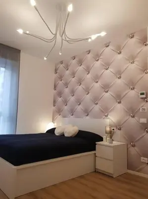 Letto o letti in una camera di Bsuites trieste in centro storico con wifi