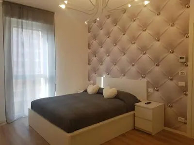 Letto o letti in una camera di Bsuites trieste in centro storico con wifi