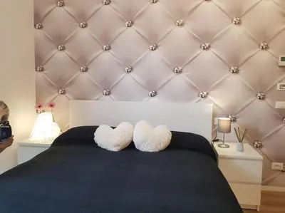 Letto o letti in una camera di Bsuites trieste in centro storico con wifi