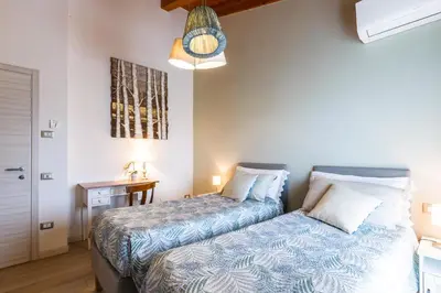 Letto o letti in una camera di B&B ARMONIE DI CAMPAGNA