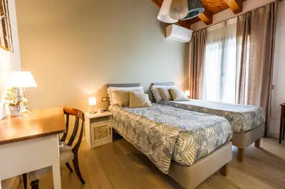 Letto o letti in una camera di B&B ARMONIE DI CAMPAGNA