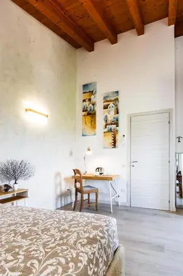 Letto o letti in una camera di B&B ARMONIE DI CAMPAGNA